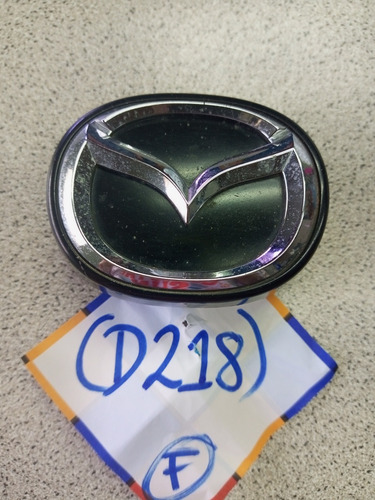 Emblema Mazda 323 Usado Foto 2