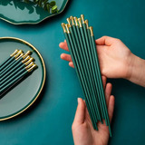 Set Palitos Chinos Metálicos Chopsticks Sushi X5 Pares Reuti
