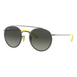 Anteojos De Sol Ray-ban Round Scuderia Ferrari Collection Standard Con Marco De Metal Color Polished Gunmetal, Lente Grey De Plástico Degradada, Varilla Polished Gunmetal/yellow De Metal - Rb3647m