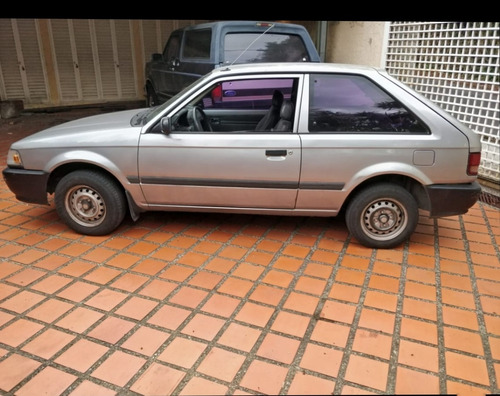 Amortiguador Trasero Mazda 323 Foto 7