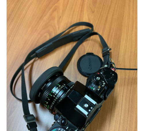 Canon A-1 Analogica+flash Nisisin+tripode Vivitar+zoom 200 
