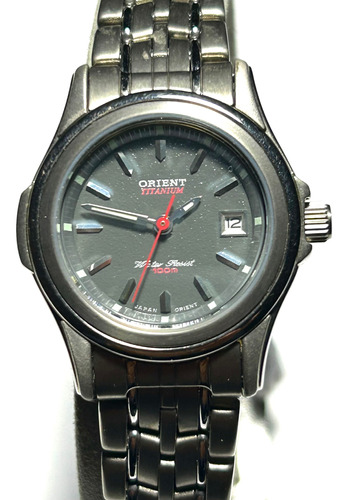 Reloj Orient Dama Quartz De Titanium  Sumergible 100 M.