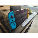Nintendo Switch Oled 64gb Color Negro Con Juegos Y Estuche 