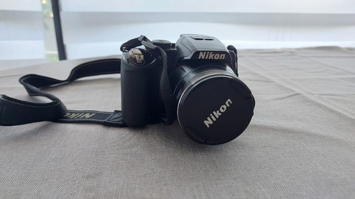  Nikon Coolpix P100 + Cargador + Bolso De Transporte