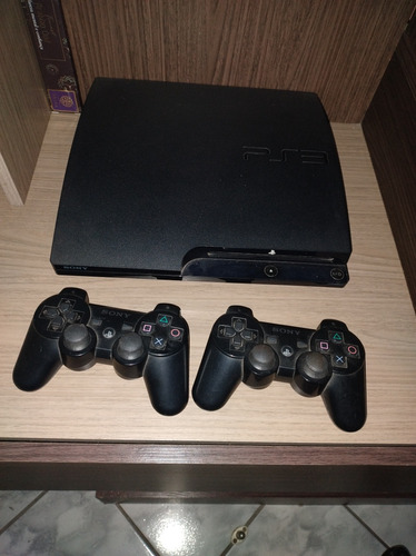 Vendo Ps3 Slim Destravado Com Dois Jogos E Um Volante Gamer