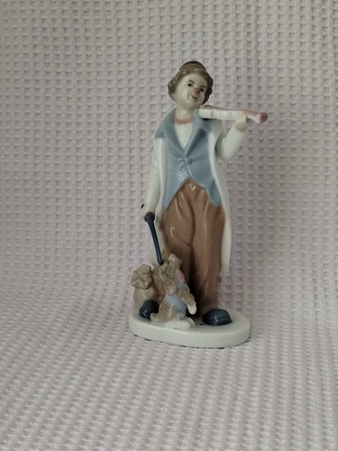 Figura De Porcelana,  Joven Músico Con Mascota 