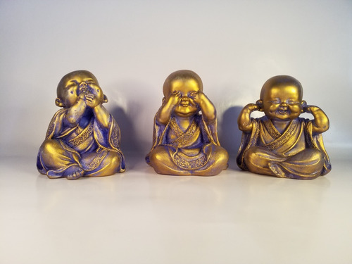 Trio Buda, Decoração, Estatuas