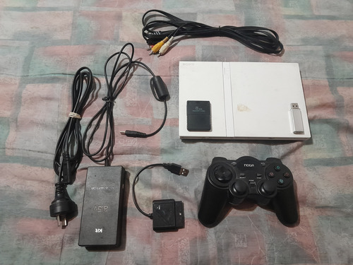 Playstation 2 + Pendrive 32gb + Memory 8mb + Joystick