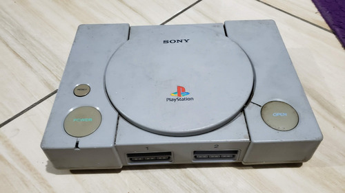 Playstation 1 Fat Só O Aparelho. O Leitor Não Leu Os Jogos. Tá Com Defeito. 504.  M60