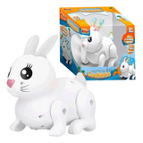 Brinquedo Infantil Coelhinho Branco Saltitante Com Luz E Som