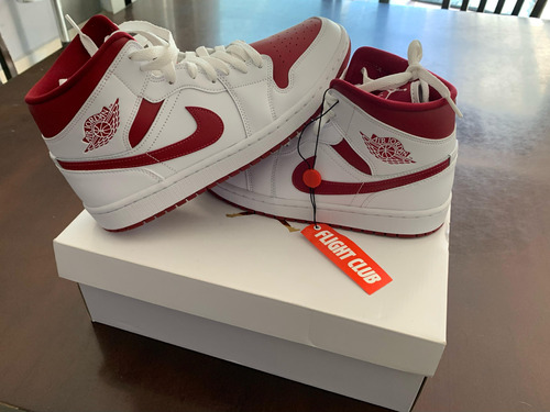 Zapatillas Nike Air Jordan 1 Mid 'white Pomegranate'.