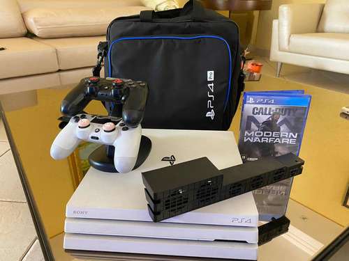 Playstation 4 Pro 1 Tb Branco + 3 Controle + 5 Jogos+coler + Bolsa+ Estação De Carregamento + 2 Cabos De Controle