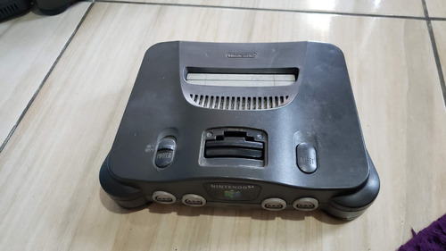 Nintendo 64 Só O Console Sem A Tampa Da Memoria E Carcaça Quebrada. Funcionando 100%. G1