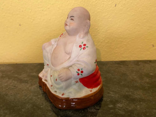 Buda Porcelana Biscuit Antigo