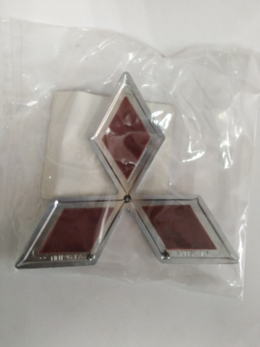 Emblema Delantero Mitsubishi Lancer Original  Foto 2