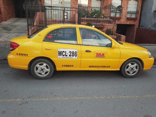 Taxi Kia Rio Stylus