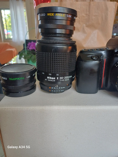 Máquina Fotográfica  Nikon Mod.n50 Mais Lentes