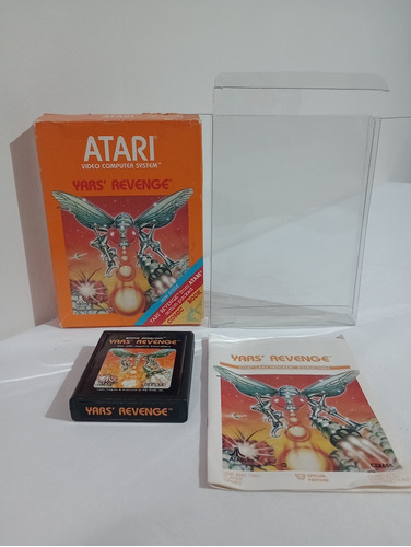 Atari 2600 Yar's Revenge Caja ,juego, Manual Y Protector (b)