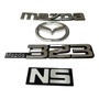 Emblema Mazda 323 Persiana Base Negra 
