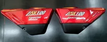 Tapas Laterales Suzuki Ax 100