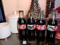 4 Botellas Se Coca Cola De La Transición Del Canal 