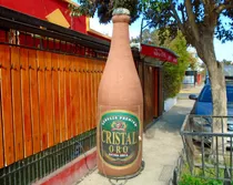 Gran Botella Inflable Cristal Oro, 2.5 Mts, Pequeña Maleta