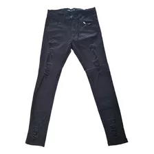 Pantalon De Jeans Chupin Con Roturas. Premium