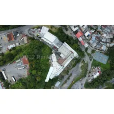 Extenso Terreno Con 3 Galpones En Venta La Trinidad Caracas 23-22097