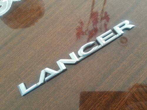 Emblema Lancer  Foto 2