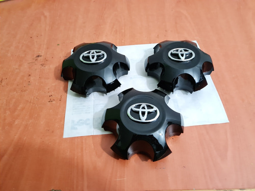 3 Tapones Centros De Rin Originales Toyota Tacoma 20/23 Uso Foto 3