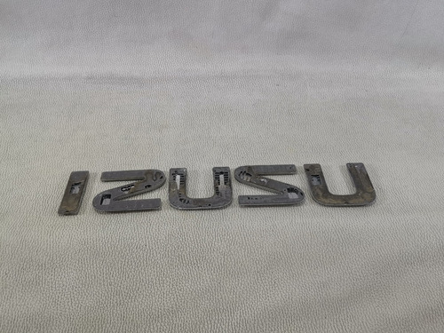 Emblema Isuzu Delantero Letras Isuzu Elf 400 Mod 2008-2018 Foto 9