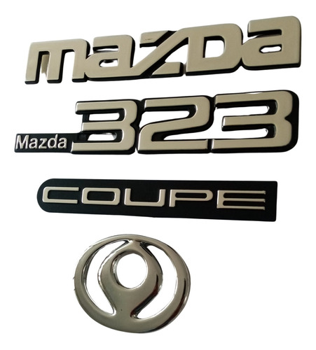 Foto de Emblemas Traseros Mazda 323 Coupe  Logo Mazda Sol Naciente 