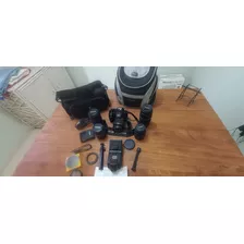 Camara Canon Eos 1000d, Con 5 Lentes Inmaculados Y Accesori 