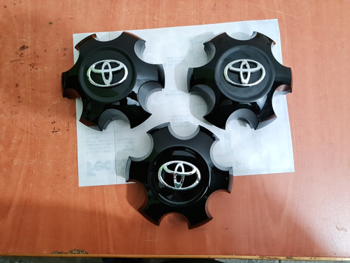 3 Tapones Centros De Rin Originales Toyota Tacoma 20/23 Uso Foto 2