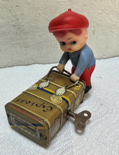 Antiguo Juguete De Hojalata Y Celuloide Niño Maletero — imagen 1