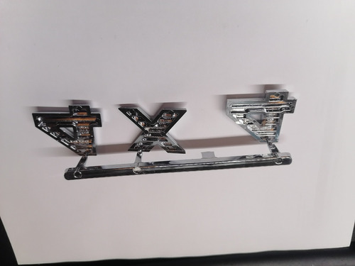 Emblema 4 X 4 Nissan Frontier 05-15 Plateada 93495ea80a Foto 7