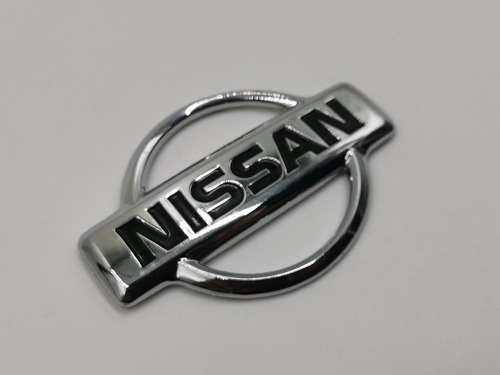 Emblema De Cofre Nissan D21 Genrico Foto 2