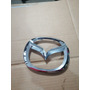 Emblema Frontal Mazda 3 04/06