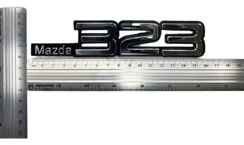 Foto de Emblema Mazda 323        Estampado 