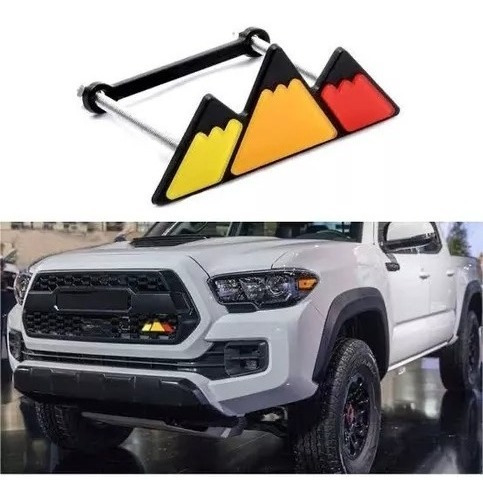 Emblema Montaas Tricolor Parrilla Toyota Tacoma Hilux Fj Foto 4