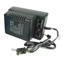 Adaptador Universal Dp-328 Voltaje Variable 1.5v A 12v