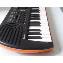 Teclado Musical Casio Mini Sa-76 44 Teclas Preto/laranja