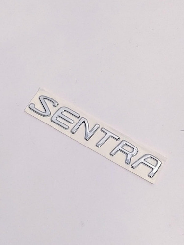 Emblema Genrico Letra Sentra Nissan 96-00 Foto 2