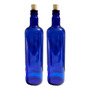 Segunda imagen para búsqueda de botella azul vidrio