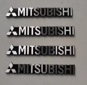 Emblemas Embellecedores De Bocinas Mitsubishi Foto 2
