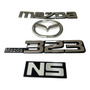 Emblema Mazda 323 Persiana Base Negra  mazda PROTEGE SE 323