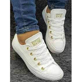 converse blancos con dorado