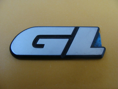 Emblema Gl Gol Voyage Parati Saveiro - Original Vw Novo