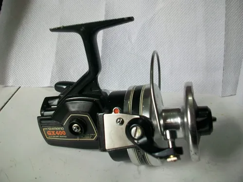 Reel Shimano Gx 400 Made In Japan Engraanjes Totalmente Metálicos Con Su Caja Original Variada Pesda Jigging Permuto (Usado)