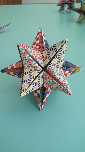 Origami. Estrella Omega. Papel De Diseño. Sourvenir